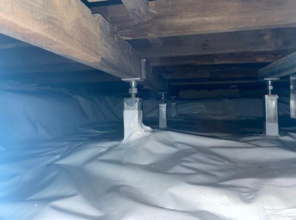 cabin-crawl-space-repair-moose-lake-mn-after CleanSpace® vapor barrier installation beneath a cabin in Moose Lake, MN