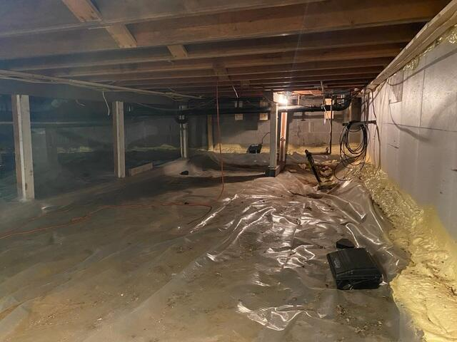 Sagging and uninsulated crawl space before foundation repair in Hayward WI