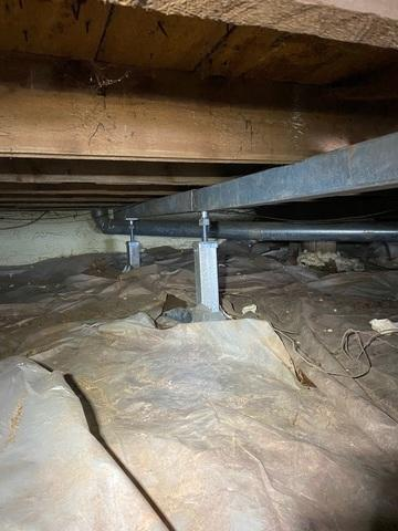 SmartJack support posts installed in a crawl space in Washburn WI