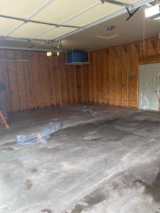 Uninsulated garage before spray foam installation in Osceola WI